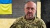 Oleksandr Pavliuk, comandantul forțelor terestre ucrainene, într-o fotografie făcută în septembrie la Donețk, spre sfârșitul primei contraofensive ucrainene. 