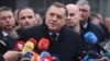 Milorad Dodik speaks to the media in front of the Court of Bosnia-Herzegovina in Sarajevo on December 6 after the trial was posponed. 