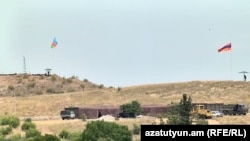 Armenia - New Armenian and Azerbaijani border posts are seen from Kirants, July 24, 2024