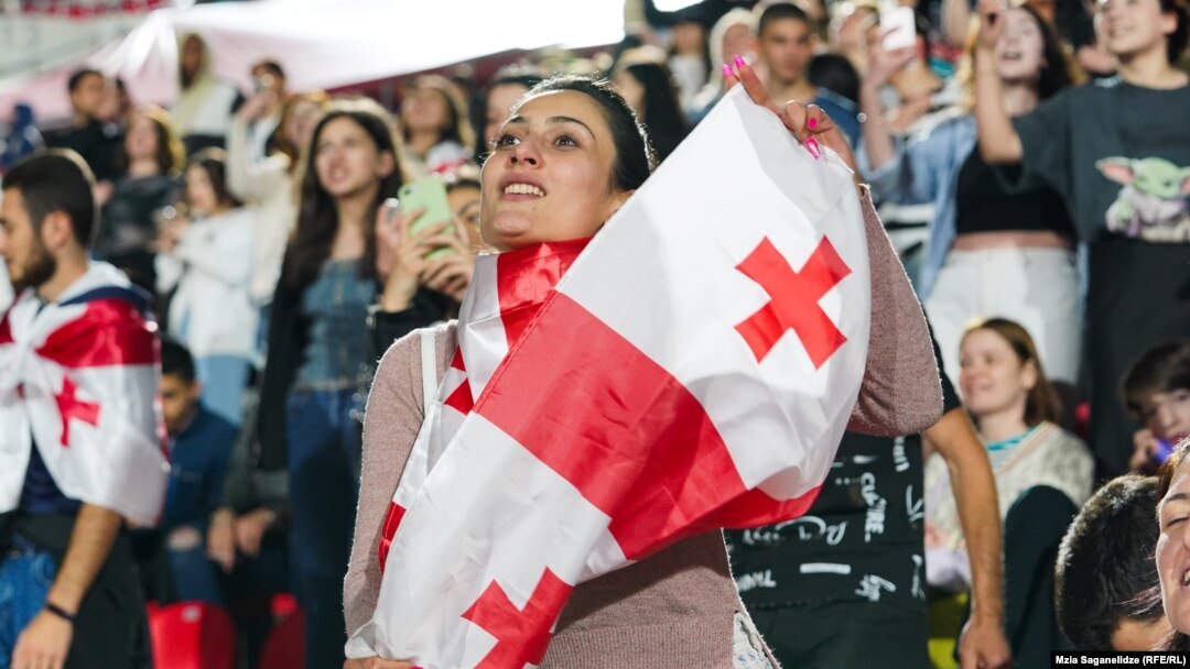 Georgian fans cheer on their team at the Euro 2024 soccer championship.