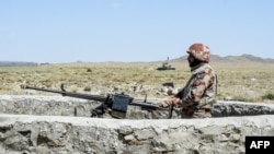 Security personnel of Pakistan's Frontier Corps stand guard in Balochistan Province.