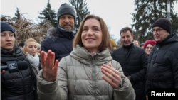 Moldovan President Maia Sandu attends a rally celebrating the European Union's decision to open membership talks with Moldova, in Chisinau on December 17.