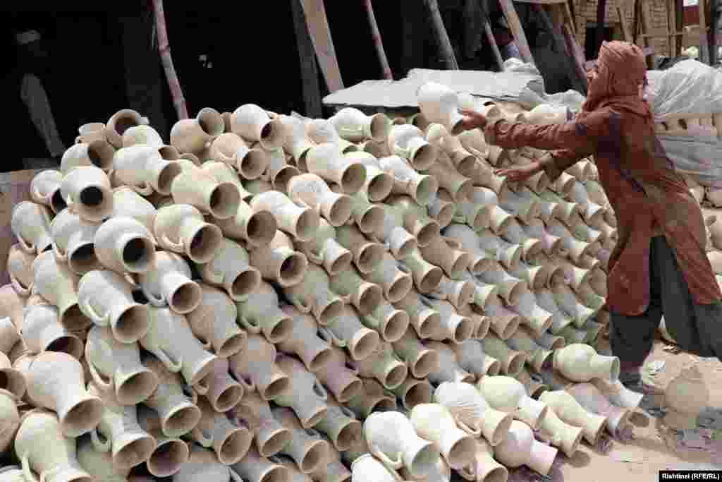 After the initial drying process, the pieces are fired to harden them before additional decoration and finishing touches are applied. However, with potters often burning rubber such as tires and plastic to heat the kilns, they regularly draw the ire of locals, who must live with the acrid smells.