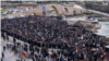 Demonstrators march against Iran's actions in Dahook in Iraq's Kurdish region on January 21.