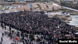 Demonstrators march against Iran's actions in Dahook in Iraq's Kurdish region on January 21.