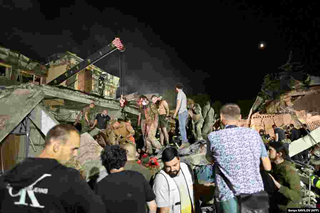 Rescuers and volunteers work to save people from under the rubble following the missile attack.&nbsp; Kramatorsk has been a frequent target of Russian attacks, including a strike on the city&#39;s railway&nbsp;station in April 2022 that killed 63 people.