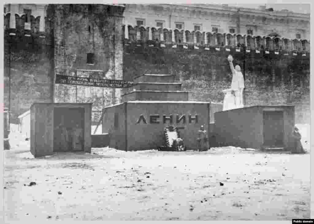 The first mausoleum for Vladimir Lenin&rsquo;s corpse, photographed probably in late January 1923. The day after Lenin died, architect Aleksei Shchusev was summoned to the Kremlin and ordered to build a monumental structure to house the body in time for the Soviet founder&rsquo;s funeral -- in just three days&rsquo; time. The wooden monument was completed on schedule and thousands of Soviet citizens began filing in to view the body. &nbsp;