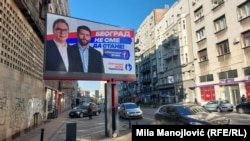 A billboard in Belgrade shows Serbian President Aleksandar Vucic (left) with former Mayor Aleksandar Sapic.