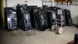 Gravestones are displayed at Volodymyr Cherdakov's workshop near Yatseve cemetery on the outskirts of Chernihiv in January.