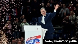 Serbian President Aleksandar Vucic gestures during a political rally of the Serbian Progressive Party (SNS) at the Stark Arena in Belgrade on December 2, ahead of the December 17 elections. 