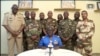 Говорителят на армията на Нигер полковник Амаду Адрамане говори по националната телевизия в сряда, 26 юли 2023 г.
