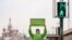 A lone Greenpeace protester in Moscow urges Russia to "go green."