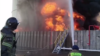 Imagine cu incendiul din portul Azov postat de Ministerul rus pentru Situații de Urgență pe 18 iunie 2024.