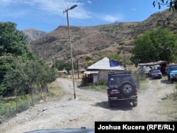 EUMA monitors' vehicles in the village of Gomk, in Armenia