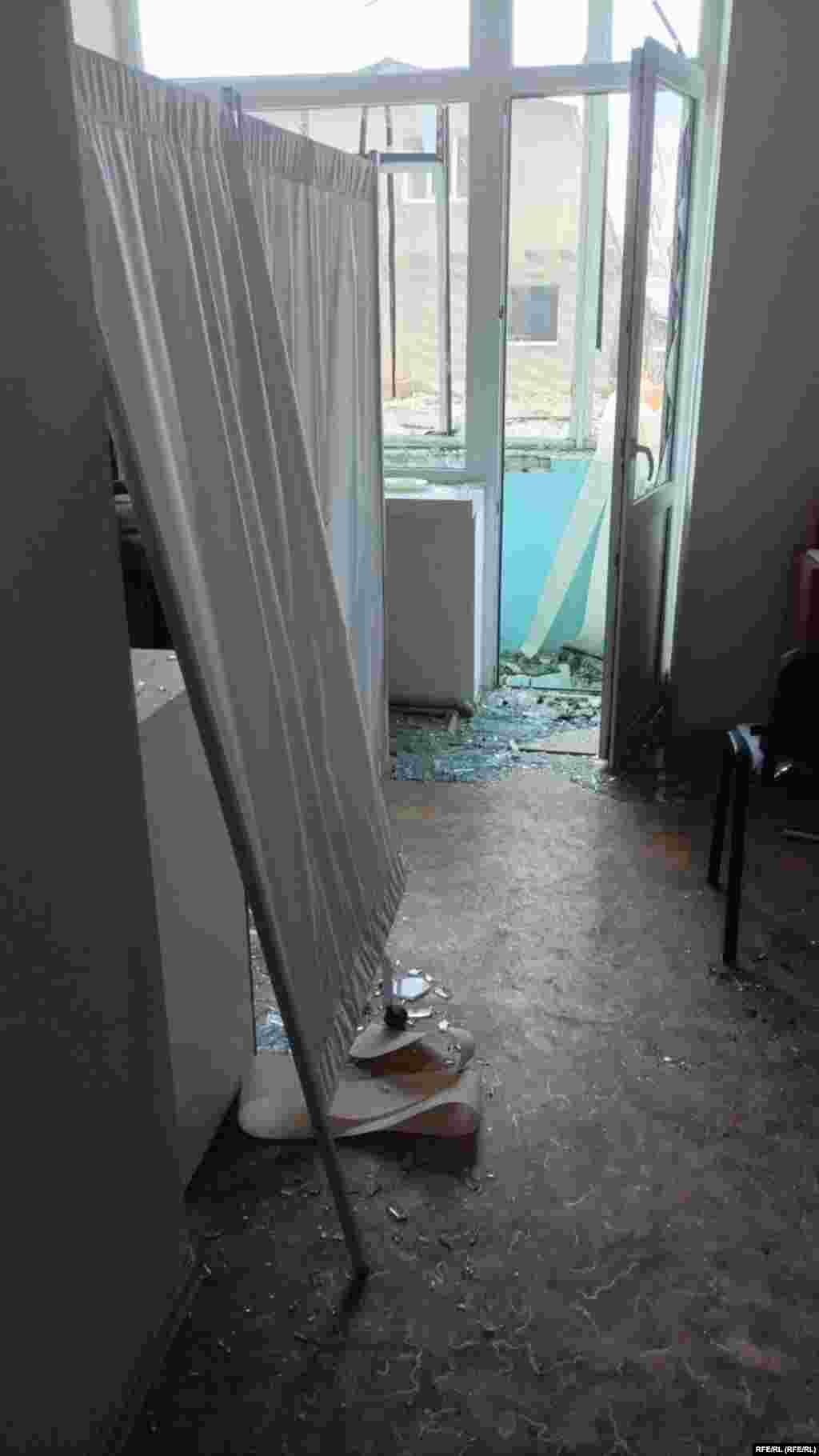 The missile strike caused widespread damage to residential areas, with many windows and doors blown out.