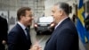 Hungarian Prime Minister Viktor Orban greets Swedish Prime Minister Ulf Kristersson in Budapest on February 23. 