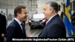 Hungarian Prime Minister Viktor Orban greets Swedish Prime Minister Ulf Kristersson in Budapest on February 23. 