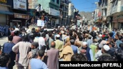 Pakistan Tehrik-e Insaf party supporters protest in Swat, northwestern Pakistan, after the arrest of Imran Khan on May 9.