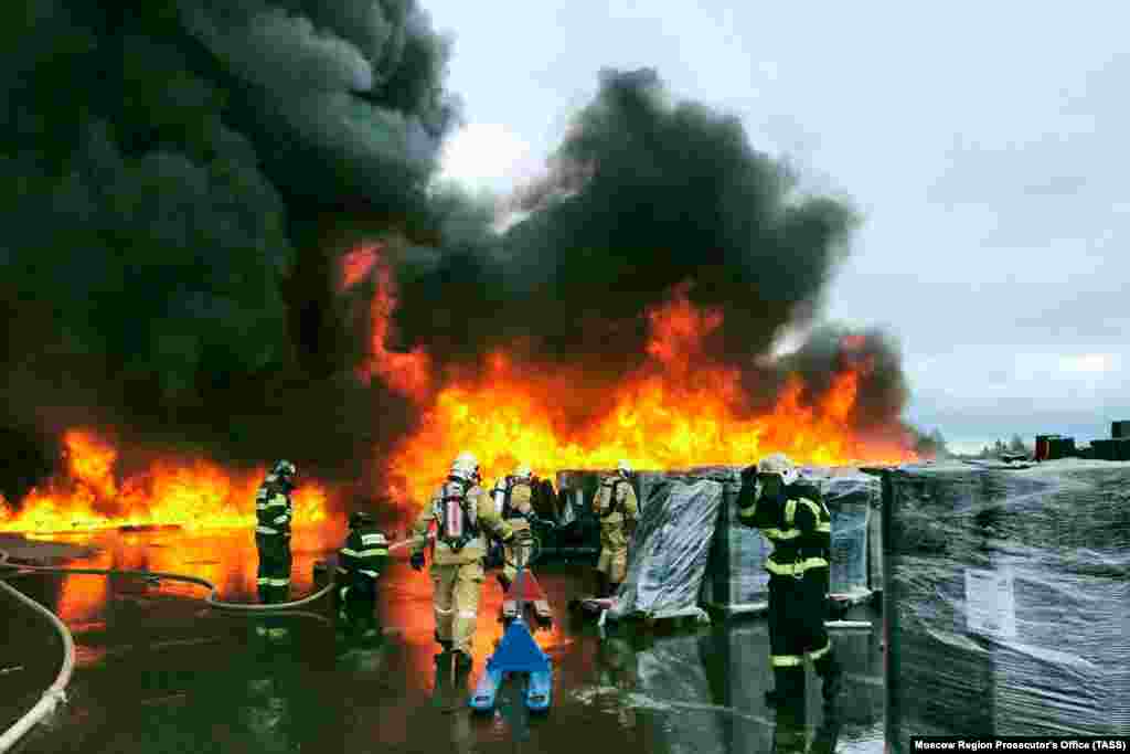 Firefighters battle a blaze at a fertilizer storage facility in Ramenskoye, near Moscow, on August 13.&nbsp;