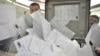 Ballot counting during an election in Novosibirsk in March. Electronic voting is being employed in many regions during regional elections being held from September 6-8. 