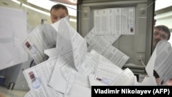 Ballot counting during an election in Novosibirsk in March. Electronic voting is being employed in many regions during regional elections being held from September 6-8. 