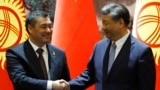 Kyrgyz President Sadyr Japarov (left) and Chinese President Xi Jinping(file photo)