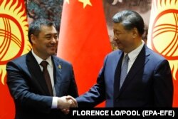 Кытайдын лидери Си Цзиньпин жана Кыргызстандын президенти Садыр Жапаров. Сиань, Кытай. 18-май, 2023-жыл.