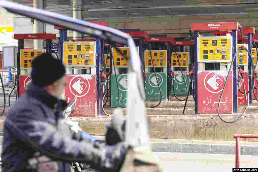  People wait at a gas station in Tehran as fuel distribution across 60 percent of Iran&#39;s gas stations was disrupted. The disruption wasdue to &quot;possible sabotage,&quot; state media reported. &nbsp; 