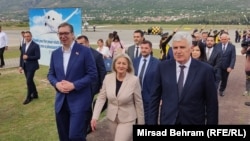 Serbian President Aleksandar Vucic (left) arrived at Mostar airport welcomed by Borjana Kristo, chairwomen of Bosnia's Council of Ministers, and Dragan Covic (right), deputy chairmen of the House of Peoples of the Bosnian parliament. 