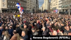 Opposition protesters rally in central Belgrade on December 30.