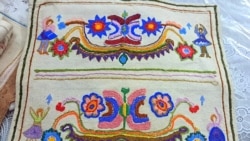 This precious, handcrafted embroidery over 100 years old was given to Olena Lazko by an elderly neighbor.