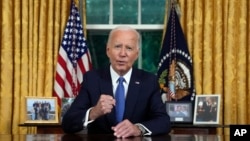 President Joe Biden addresses the nation from the Oval Office of the White House in Washington on July 24 about his decision to drop his reelection bid.