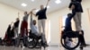 Armenia - disabled veterans in wheelchairs rehearse for a dance performance in Yerevan