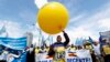 Romanian teachers chant anti-government slogans during a union protest in front of government headquarters in Bucharest on May 10.