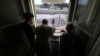 Pope Francis leads the Angelus prayer from his window at the Vatican on July 23.