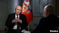 Кадър на руския президент Владимир Путин от интервюто му за руската държавна телевизия, 13 март 2024 г.