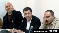 Armenia - Opposition leader Armen Ashotian (left) greets supporters during his trial in Yerevan, April 11, 2024.