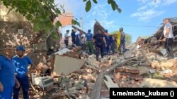 სავაჭრო ცენტრის ნანგრევები კრასნოდარის მხარის ქალაქ აფშერონსკში. 22 ივლისი, 2024.