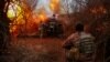 Ukrainian soldiers from the 126th Separate Territorial Defense Brigade fire a D-30 howitzer toward Russian positions&nbsp;near the southern city of Kherson on March 12.<br />
<br />
Despite artillery and equipment shortages, Kyiv&#39;s troops are continuing their battle to slow the Russian advance along a nearly 1,200 kilometer front.