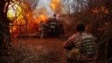 Ukrainian soldiers from the 126th Separate Territorial Defense Brigade fire a D-30 howitzer toward Russian positions&nbsp;near the southern city of Kherson on March 12.<br />
<br />
Despite artillery and equipment shortages, Kyiv&#39;s troops are continuing their battle to slow the Russian advance along a nearly 1,200 kilometer front.