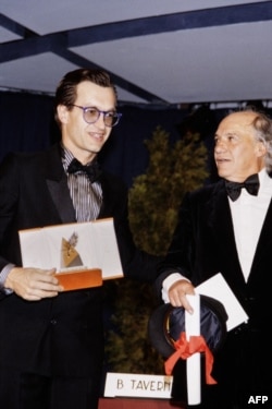  Вим Вендерс (вляво) на 23 май 1984 година със своята 