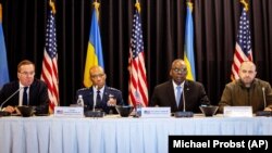 A Ramstein format meeting in March in Germany. U.S. Defense Secretary Lloyd Austin (second right) told an April 26 meeting that donated F-16 fighter jets, trained pilots, and service personnel will begin arriving in Ukraine this year.