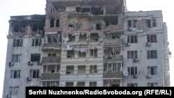 ساختمان رهایشی در کی‌یف پایتخت اوکراین که در اثر حملات هوایی روسیه تخریب شده است. May 30, 2023