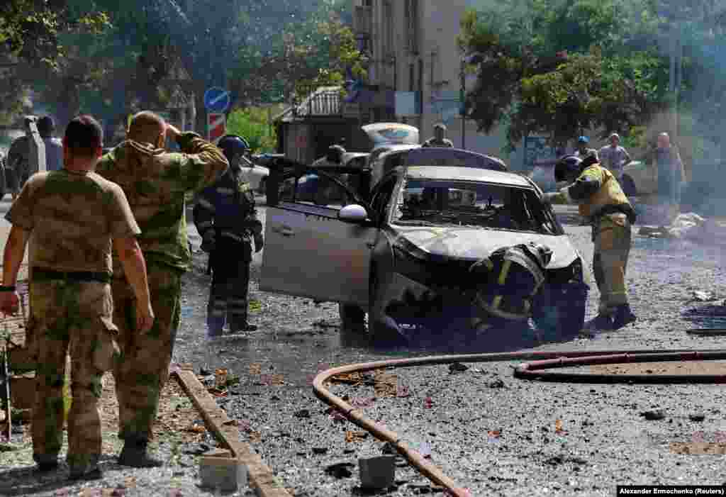 Emergency personnel work at the site of the shelling. In a statement posted on Telegram, Pushilin said that the casualties occurred when Ukrainian shells hit a civilian bus.&nbsp; &nbsp;