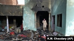 PHOTO GALLERY: Churches Burned As Mobs Attack Pakistan's Christian Community (CLICK TO VIEW)