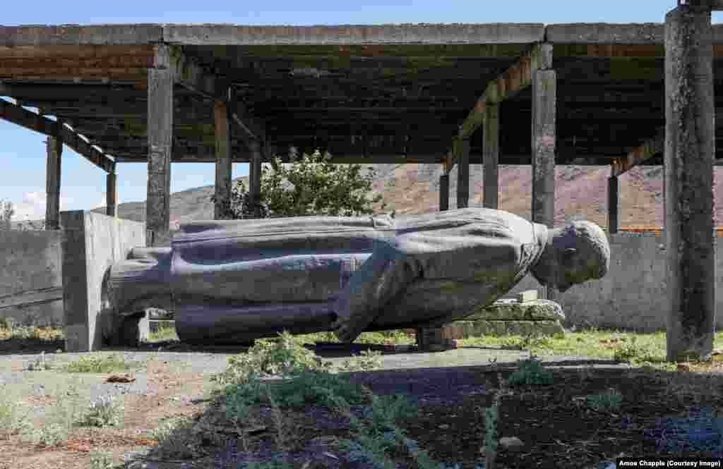 A September 2022 photo of a Stalin statue hidden in a private factory courtyard in Gori. The statue once stood on a prominent square in the city but was removed in June 2010. Debate has raged ever since in Gori -- where Stalin was born in 1878 -- over whether the monument should be resurrected.&nbsp;