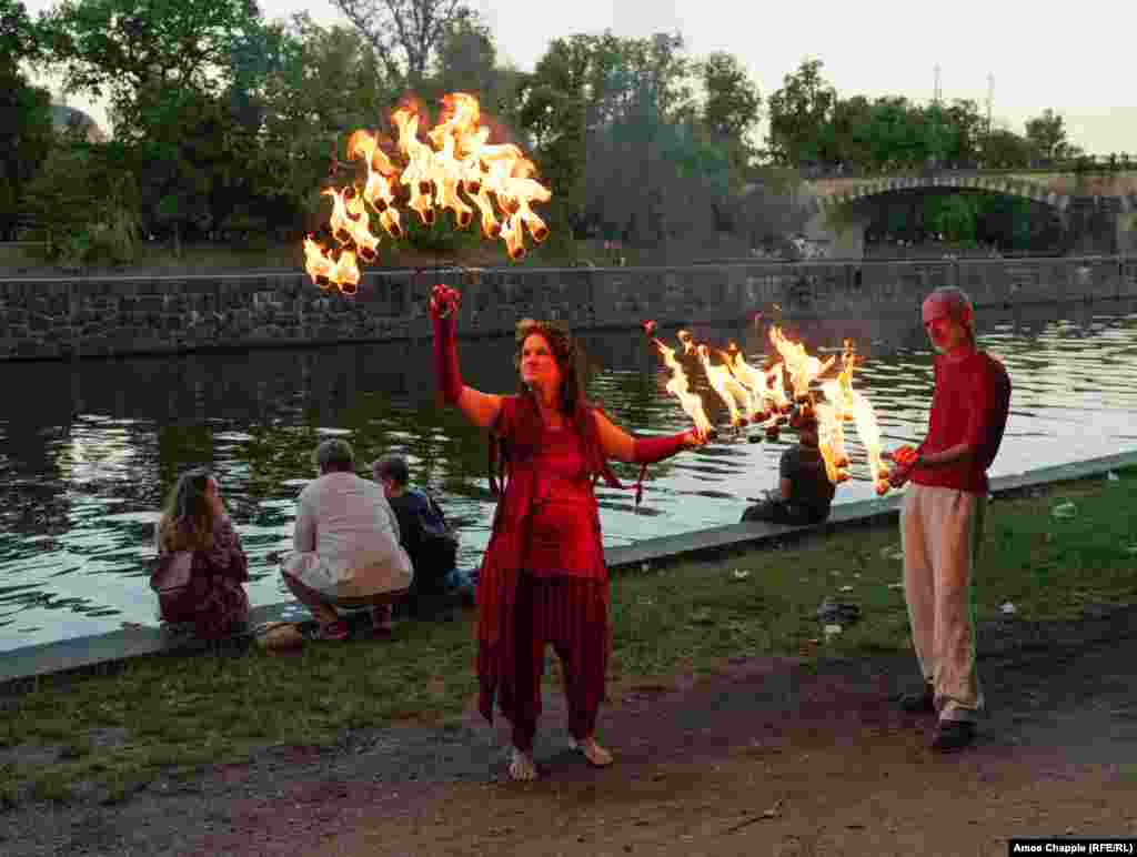 Performers prepare to make a fiery gate for festival-goers to walk through. The July 8 event opened with a minute&rsquo;s silence for the victims of Russian missile strikes that shocked the world the same day.&nbsp;