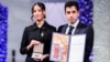 Kiana (left) and Ali Rahmani accepted the Nobel Peace Prize on behalf of their imprisoned mother in December 2023.
