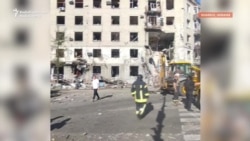 Russian Strike On Kharkiv Apartment Building Leaves Dead, Injured