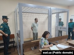 Blogger Abdukodir Muminov in a courtroom in Tashkent on July 23.